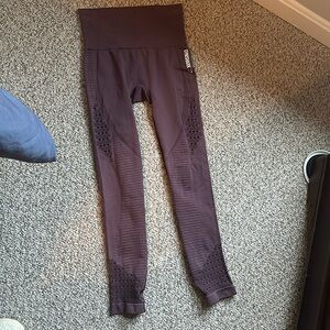 Gym shark leggings. Not entirely sure of size fits like M.